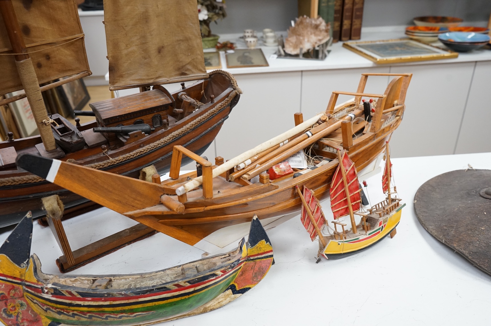 A model of a Chinese junk, a model ship and two other models of boats, largest 71cm in length